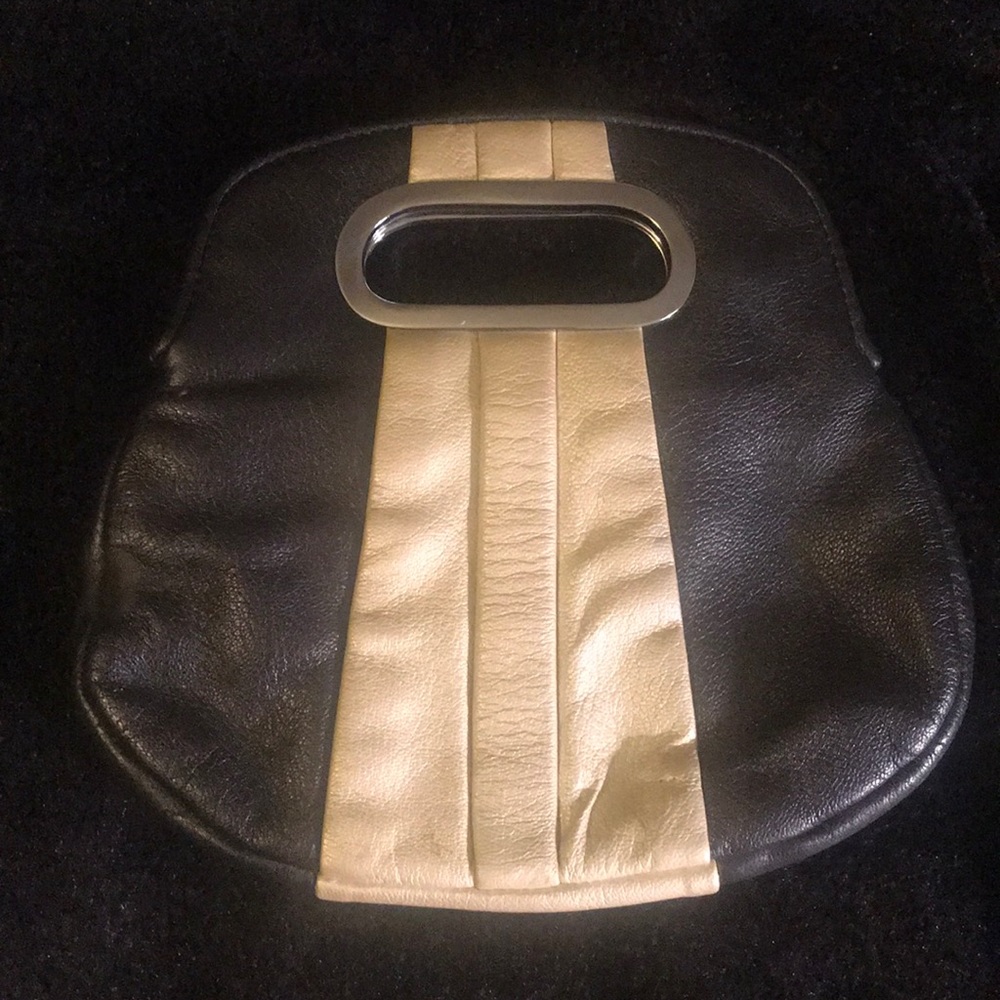 Black clutch with white racing stripe